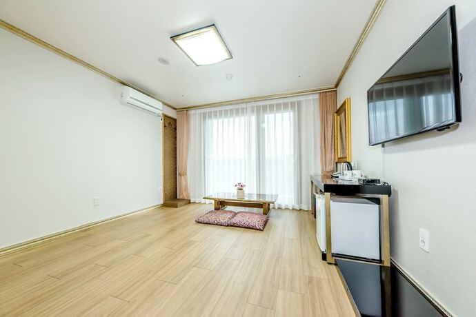 Imagen de la habitación del Hotel Jeju Pearly. Foto 13