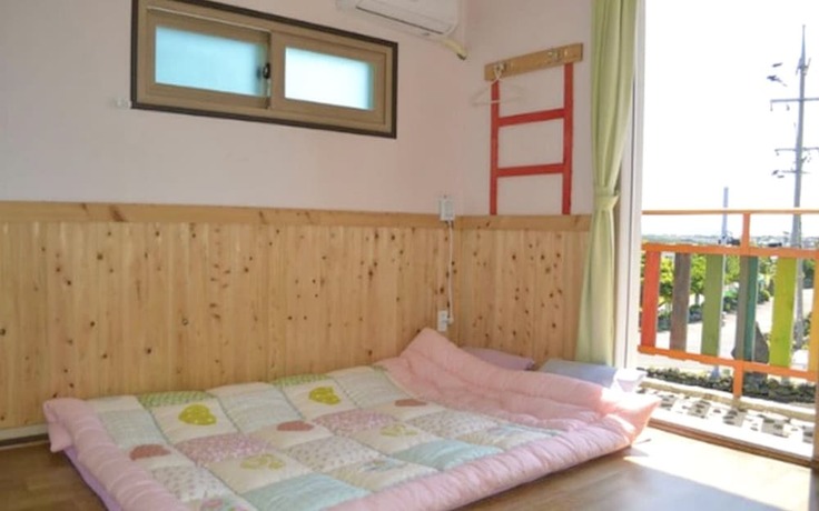 Imagen de la habitación del Hotel Jeju Rainbow Pension and Guest House. Foto 13