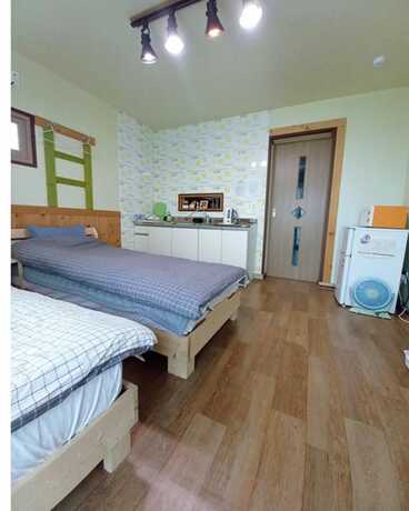 Imagen de la habitación del Hotel Jeju Rainbow Pension and Guest House. Foto 15