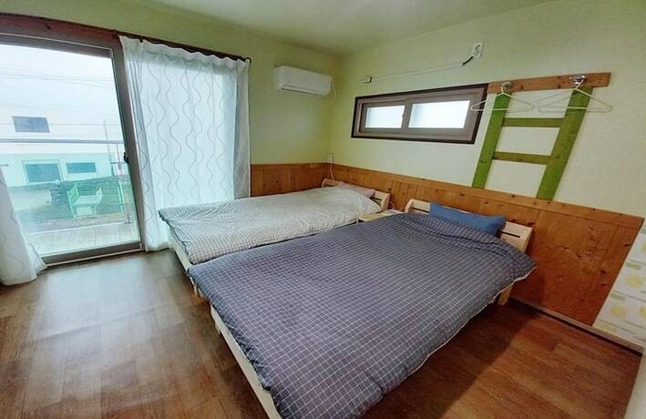 Imagen de la habitación del Hotel Jeju Rainbow Pension and Guest House. Foto 18