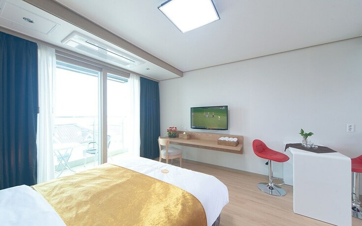 Imagen de la habitación del Hotel Jeju Swansea Resort. Foto 13