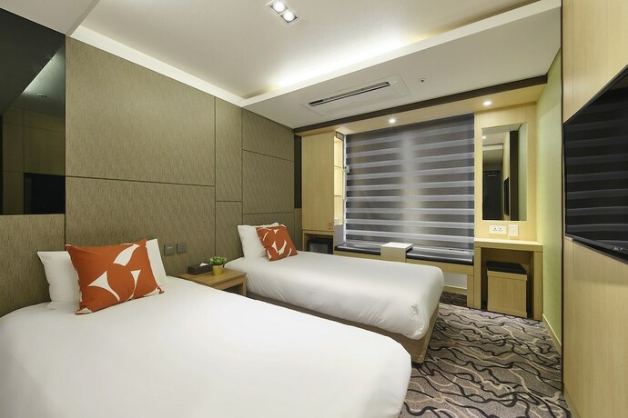 Imagen de la habitación del Hotel Jeju Western Grace. Foto 10