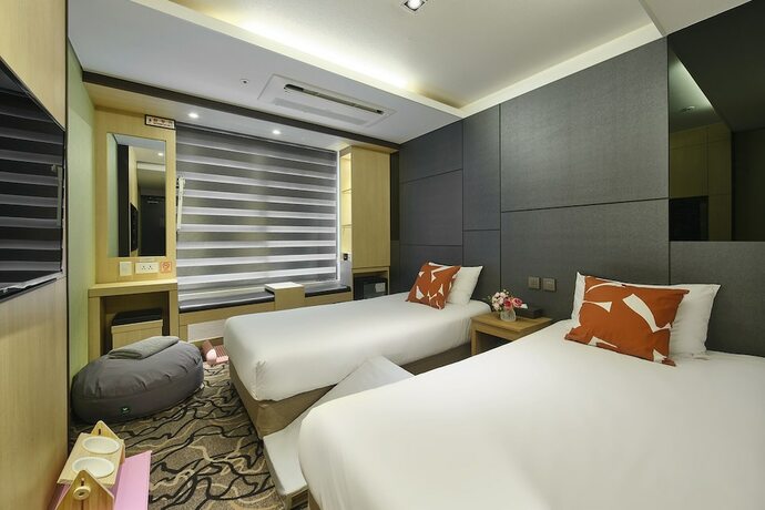 Imagen de la habitación del Hotel Jeju Western Grace. Foto 12