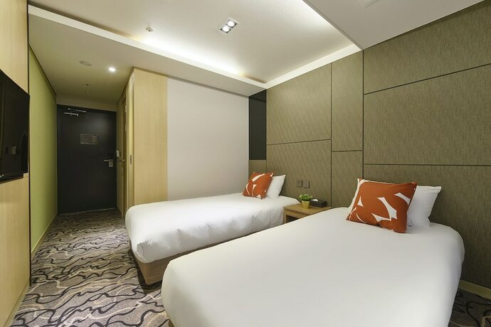 Imagen de la habitación del Hotel Jeju Western Grace. Foto 14