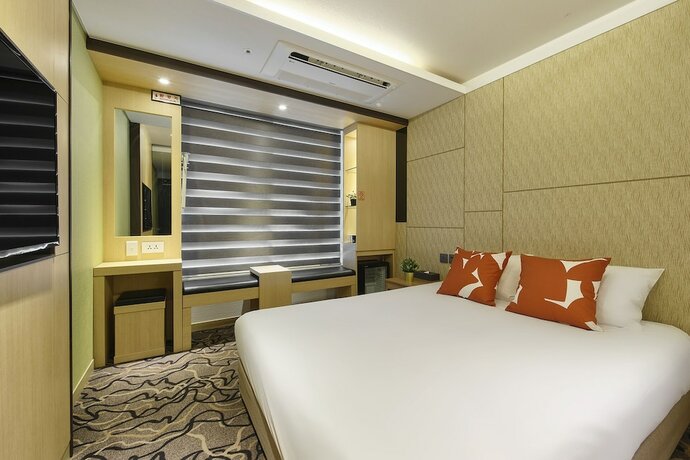 Imagen de la habitación del Hotel Jeju Western Grace. Foto 15