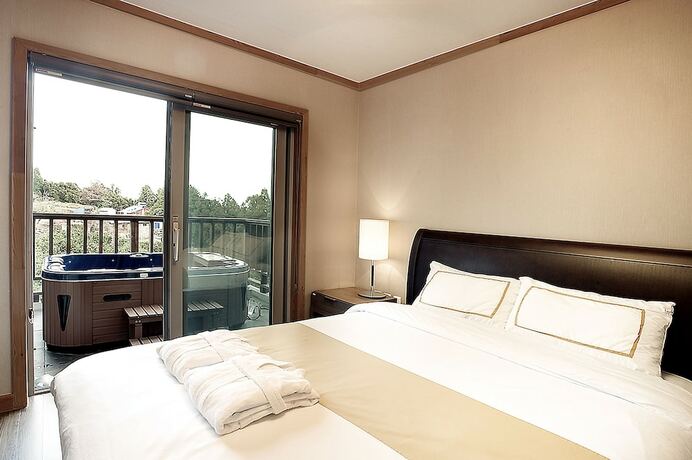 Imagen de la habitación del Hotel Jejueco Suites. Foto 16