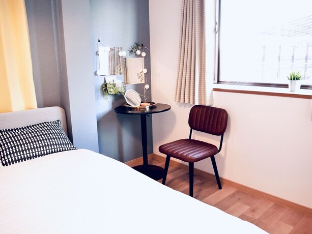 Imagen de la habitación del Hotel Jen's House Osaka. Foto 32
