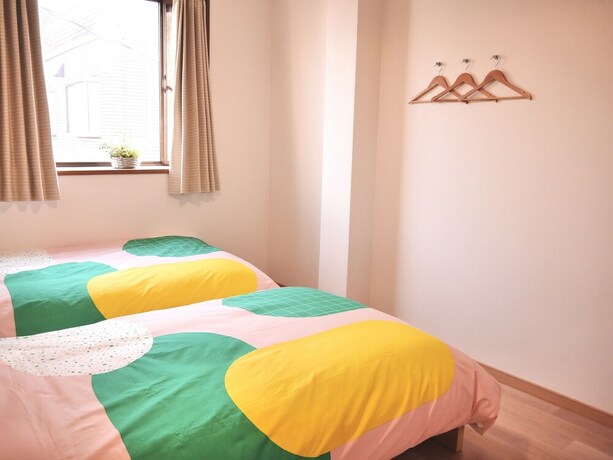 Imagen de la habitación del Hotel Jen's House Osaka. Foto 34