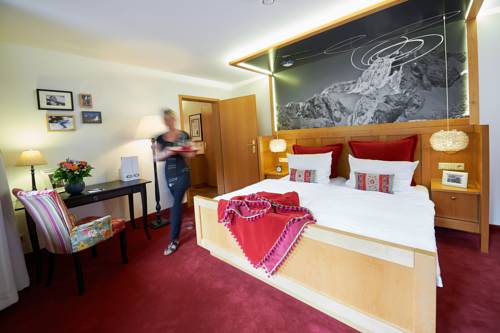 Imagen de la habitación del Hotel Jens Weissflog Appartementhotel. Foto 7