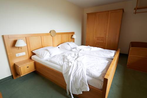 Imagen de la habitación del Hotel Jens Weissflog Appartementhotel. Foto 13