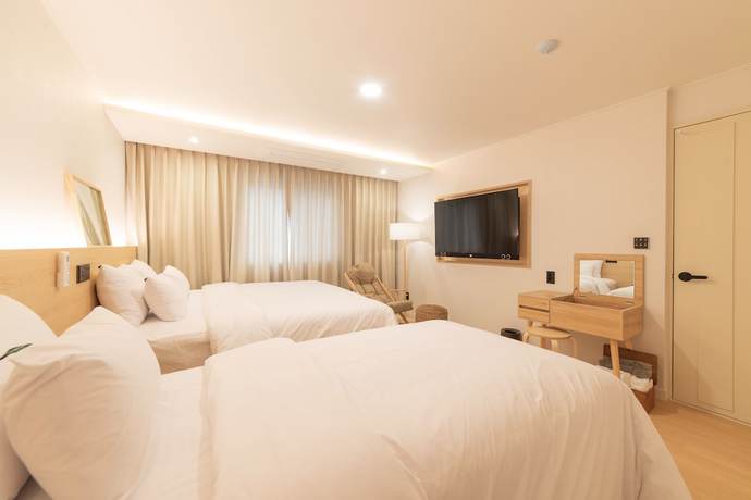 Imagen de la habitación del Hotel Jeongseong. Foto 18