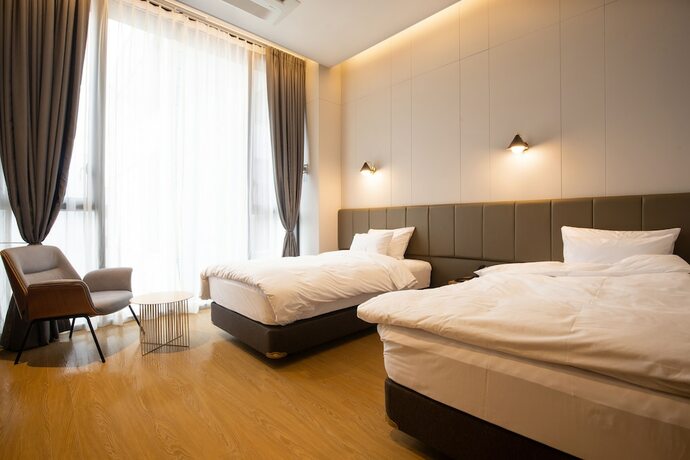 Imagen de la habitación del Hotel Jeonju Tourist Kkotsim. Foto 13