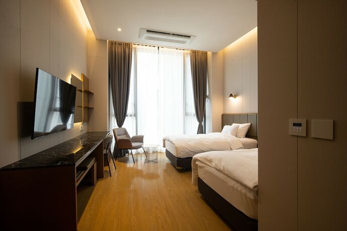 Imagen de la habitación del Hotel Jeonju Tourist Kkotsim. Foto 14