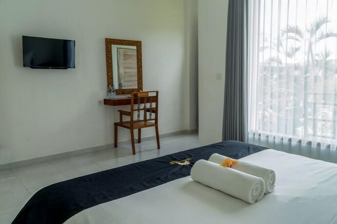 Imagen de la habitación del Hotel Jepun Sari Uluwatu. Foto 30