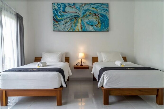 Imagen de la habitación del Hotel Jepun Sari Uluwatu. Foto 31