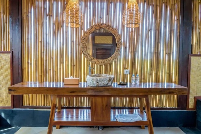 Imagen de la habitación del Hotel Jepun Sari Uluwatu. Foto 34