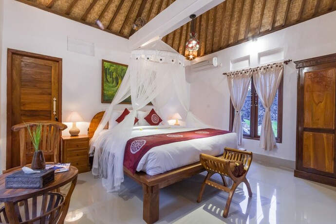 Imagen de la habitación del Hotel Jero Sebali Villa. Foto 27