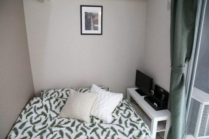 Imagen de la habitación del Hotel Jesus Square Nipponbashi. Foto 29