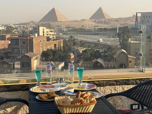 Imagen de la habitación del Hotel Jewel Grand Museum Pyramids View. Foto 11