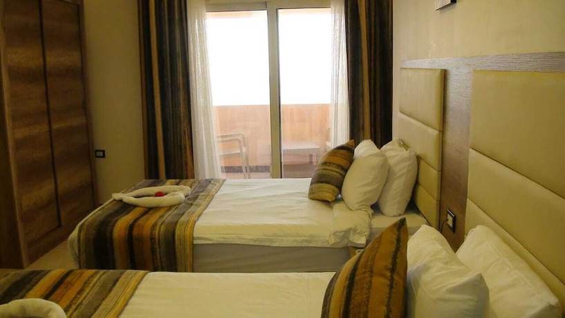 Imagen de la habitación del Hotel Jewel San Stefano. Foto 11