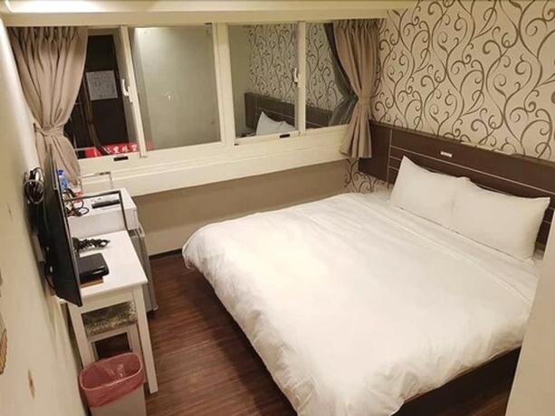 Imagen de la habitación del Hotel Jhong-sing. Foto 6
