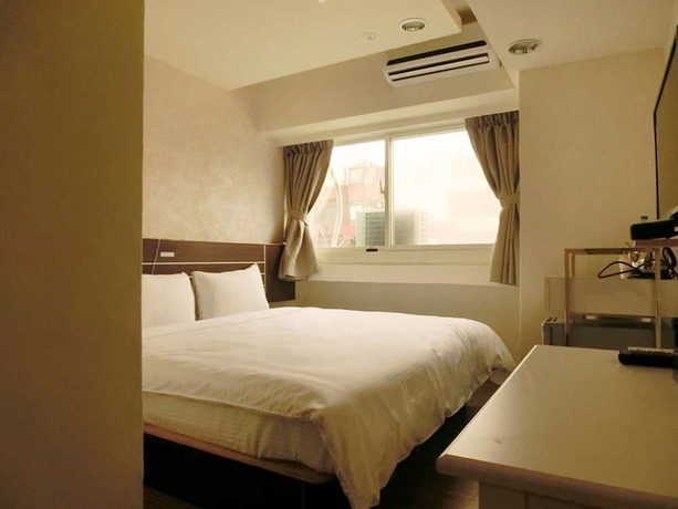 Imagen de la habitación del Hotel Jhong-sing. Foto 8