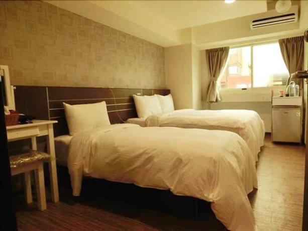 Imagen de la habitación del Hotel Jhong-sing. Foto 12