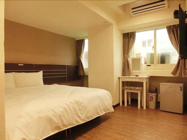 Imagen de la habitación del Hotel Jhong-sing. Foto 14
