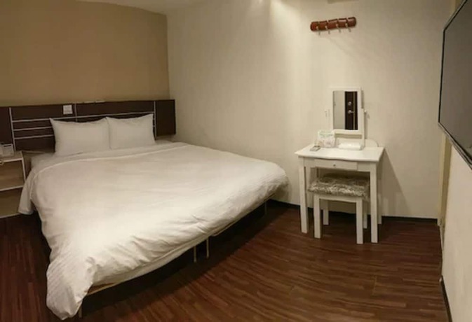 Imagen de la habitación del Hotel Jhong-sing. Foto 15