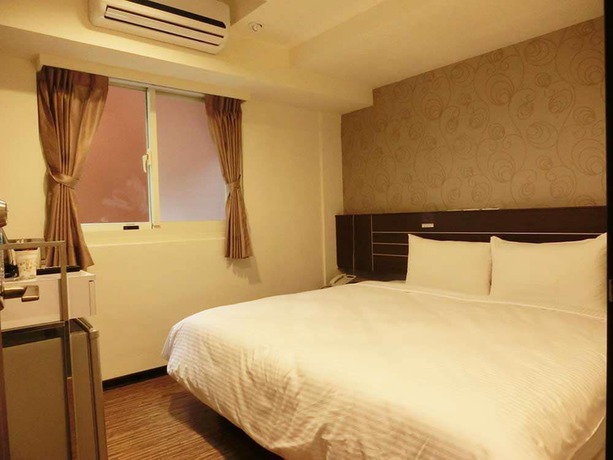 Imagen de la habitación del Hotel Jhong-sing. Foto 16
