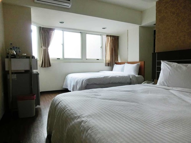 Imagen de la habitación del Hotel Jhong-sing. Foto 17
