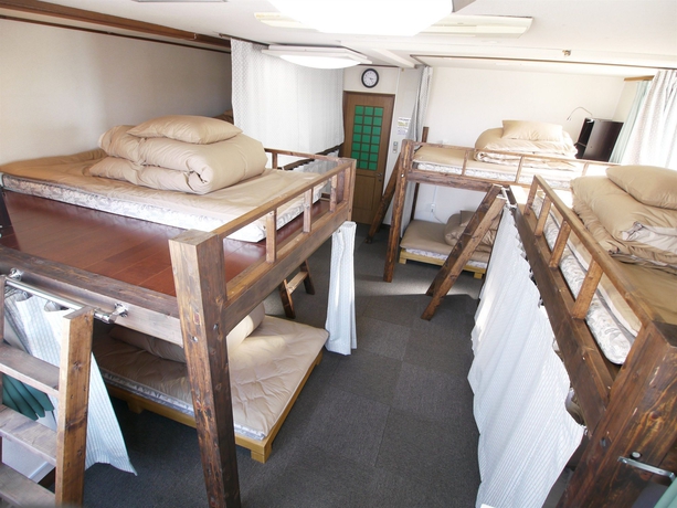 Imagen de la habitación del Hotel J-hoppers Kyoto Guesthouse. Foto 5