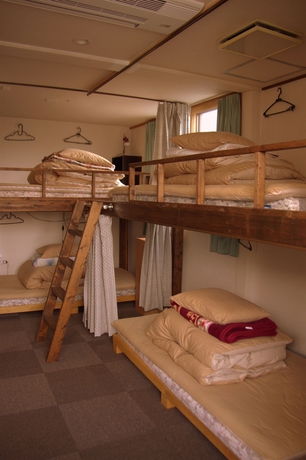 Imagen de la habitación del Hotel J-hoppers Kyoto Guesthouse. Foto 8