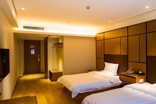 Imagen de la habitación del Hotel Ji Changsha Dongtang. Foto 9