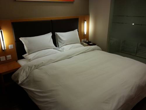 Imagen de la habitación del Hotel Ji Culture Center Tianjin. Foto 3