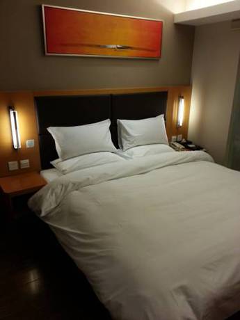 Imagen de la habitación del Hotel Ji Culture Center Tianjin. Foto 4