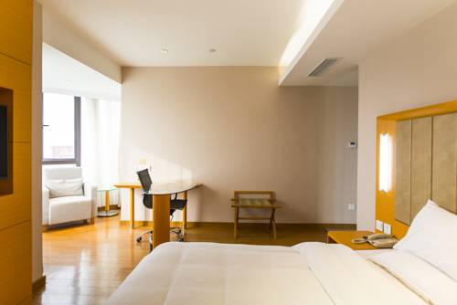 Imagen de la habitación del Hotel Ji Development Area Dalian. Foto 7