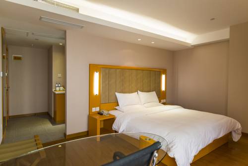 Imagen de la habitación del Hotel Ji Development Area Dalian. Foto 9