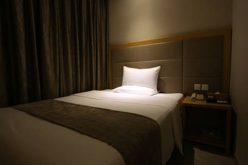 Imagen de la habitación del Hotel Ji Dongzhimen Beijing. Foto 2