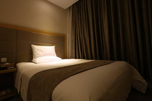 Imagen de la habitación del Hotel Ji Dongzhimen Beijing. Foto 4