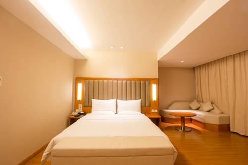 Imagen de la habitación del Hotel Ji Guangzhou Yuexiu Park. Foto 7