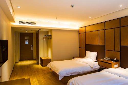Imagen de la habitación del Hotel Ji Guiyuang Xiaohexiangjiang Road. Foto 6