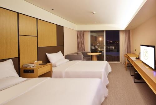 Imagen de la habitación del Hotel Ji Hangzhou Chaowang Road. Foto 10
