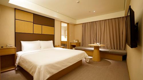 Imagen de la habitación del Hotel Ji Hotel Nanjing Confucius Temple Center. Foto 8