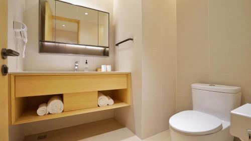 Imagen de la habitación del Hotel Ji Hotel Shanghai Hongqiao National Exhibition and Convention Center Xujing. Foto 7