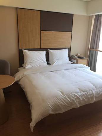 Imagen de la habitación del Hotel Ji Jinan Quancheng Square. Foto 3