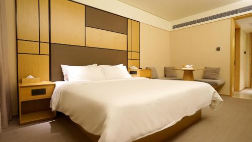 Imagen de la habitación del Hotel Ji Shanghai Guangda Liuzhou Road. Foto 3