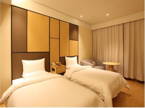Imagen de la habitación del Hotel Ji Shanghai Guangda Liuzhou Road. Foto 6