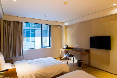 Imagen de la habitación del Hotel Ji Shanghai Hongqiao Hub Jiuting. Foto 7