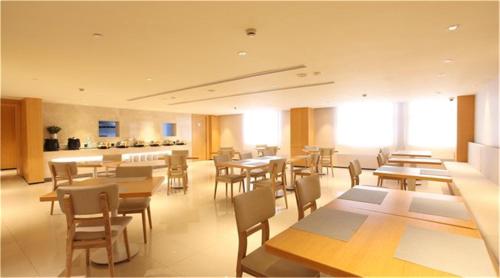 Imagen de la habitación del Hotel Ji Shanghai Hongqiao National Exhibition And. Foto 8